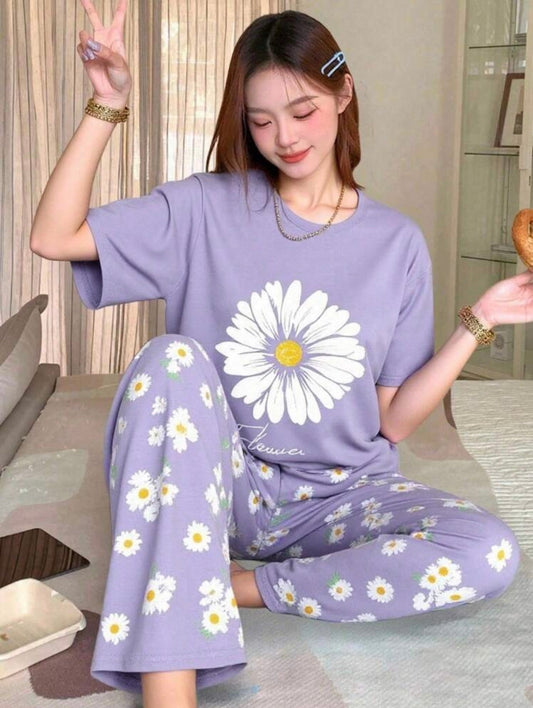 Women's purple floral printed cotton night suit featuring soft breathable fabric and comfortable all-season sleepwear.